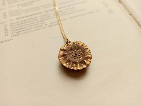 ceramic gold-brown flower diffuser necklace