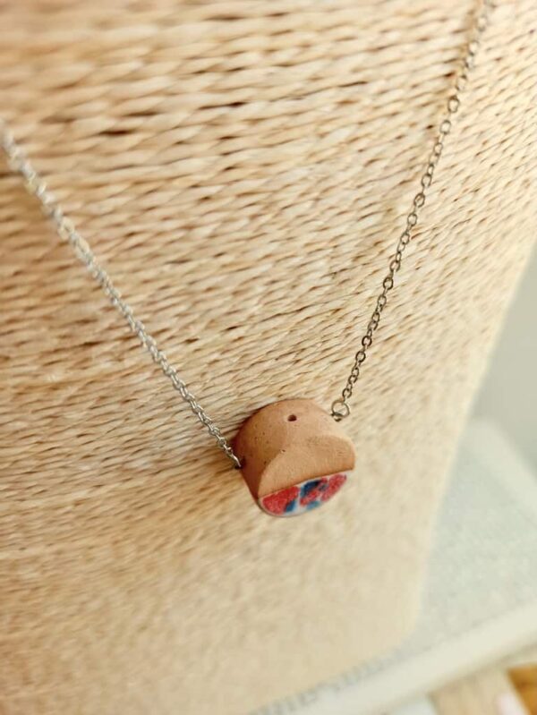 blue-red drum bottle necklace