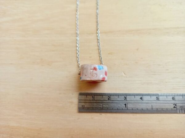 blue-red drum bottle necklace