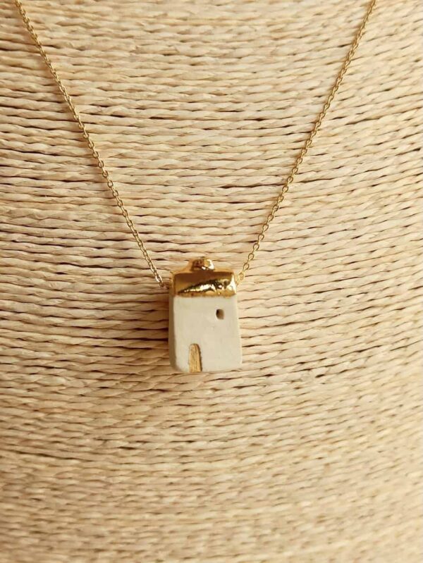 golden house diffuser necklace