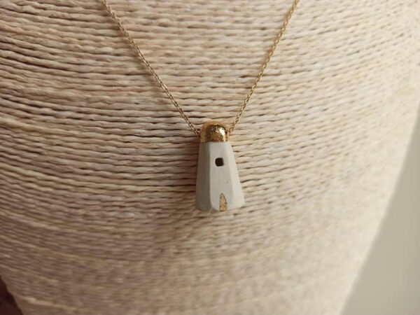 golden house diffuser necklace