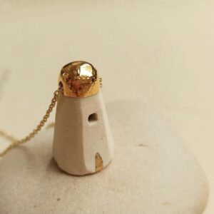 golden house diffuser necklace