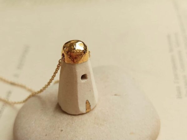 golden house diffuser necklace