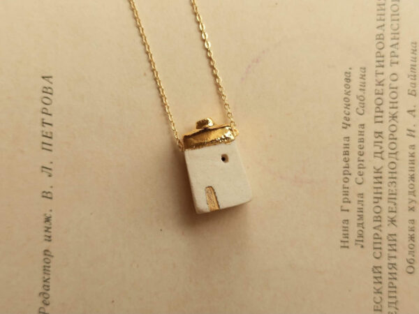 golden house diffuser necklace