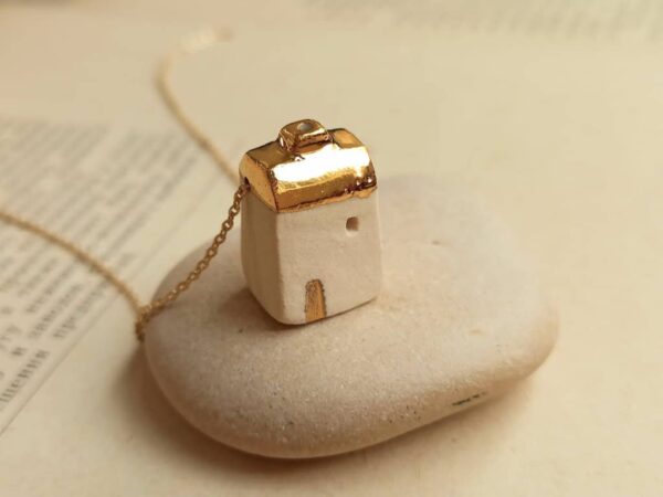 golden house diffuser necklace