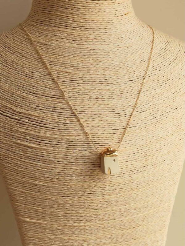 golden house diffuser necklace