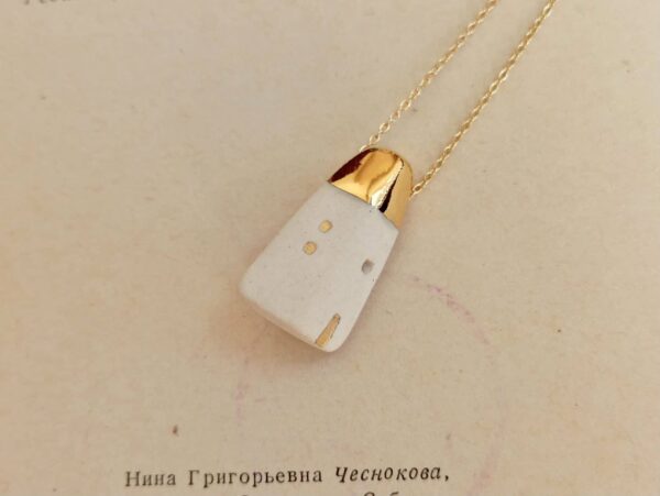 golden house diffuser necklace