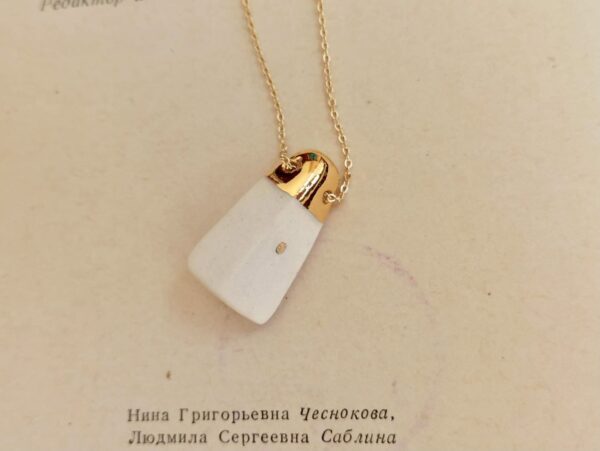 golden house diffuser necklace