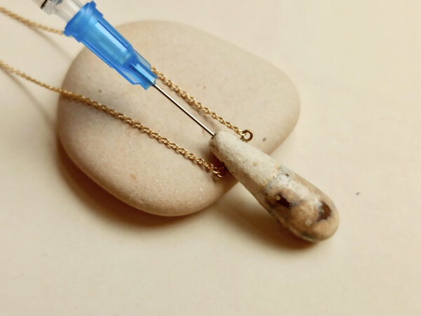 Slender droplet ceramic diffuser necklace