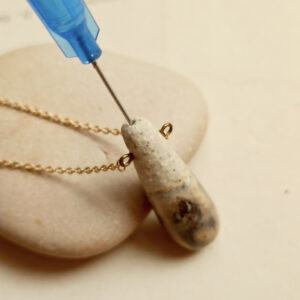 Slender droplet ceramic diffuser necklace