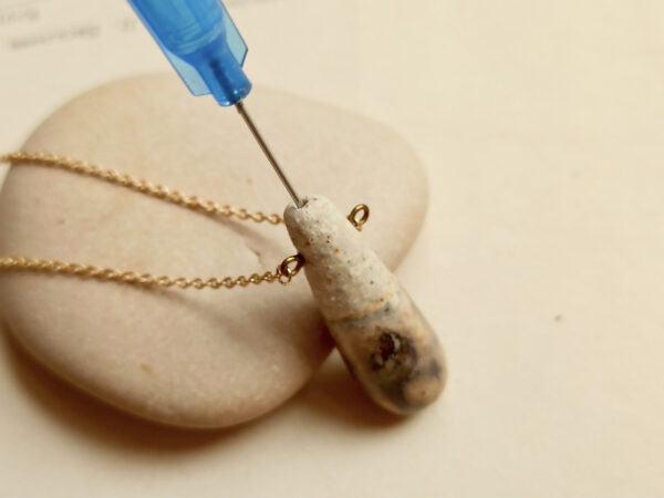 Slender droplet ceramic diffuser necklace