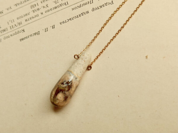 Slender droplet ceramic diffuser necklace