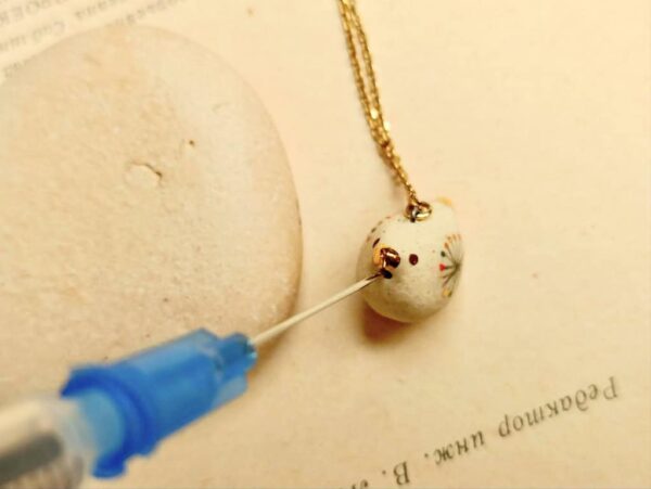 colour dotted bird ceramic diffuser necklace